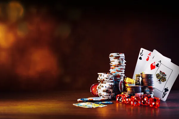 CROWNBD — A high-class gaming experience without limits A woman in a luxurious green gown next to an ornate roulette wheel, capturing the upscale casino mood of CROWNBD.